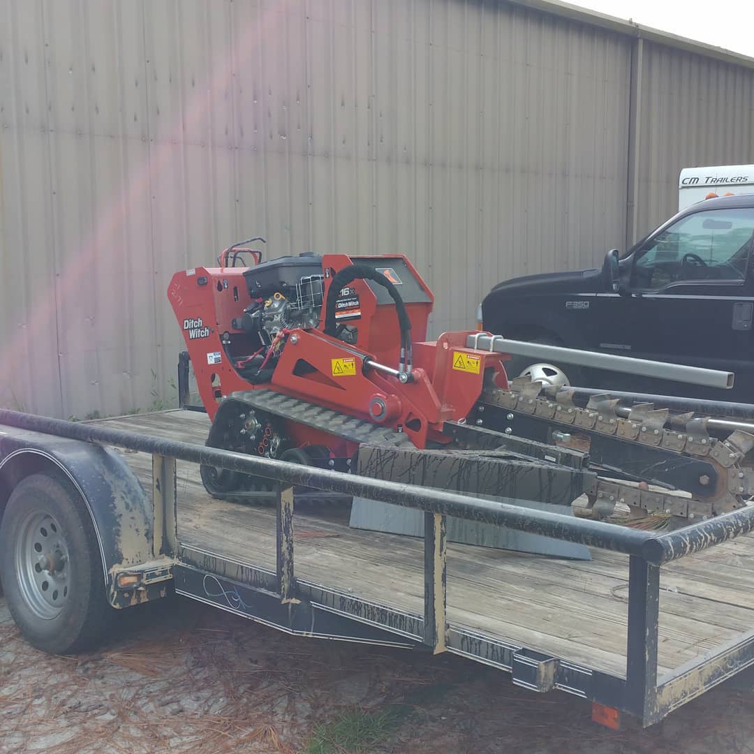 Digging gas lines?  Trencher and trailer jist in from one job and ready for the next.