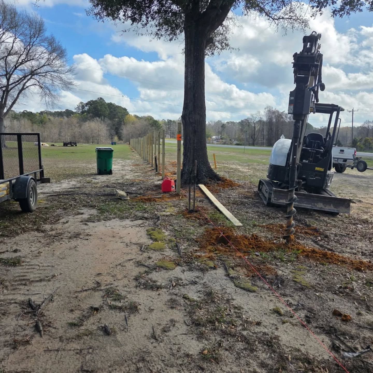 Easiest way to build a fence?  Sitting on your ass with a big drill bit in front of you. 

#DeRidderRentals #auger #fence